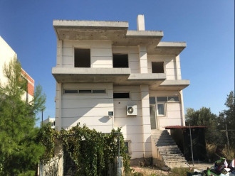 Κτίριο μικτής χρήσης, Λουτράκι